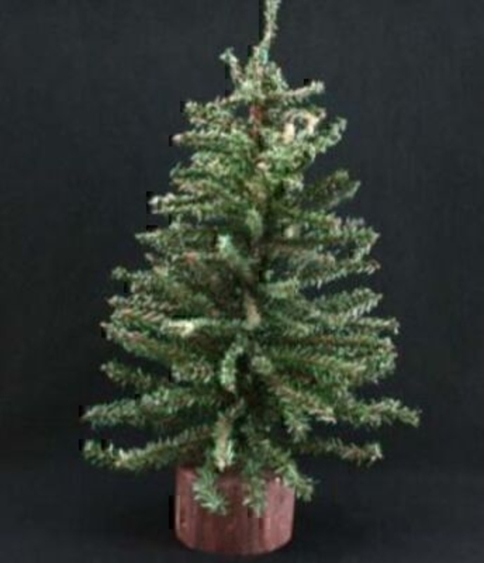 This mini Gisela Graham Christmas tree with a log base looks just like the real thing but a lot smaller. A great idea if you are limited in space but will still make a great addition to any homes Christmas Decorations. Size 60cm<br><br>
Gisela Graham has a beautiful range of Christmas trees made from faux fir, twigs, From large to small.  Gisela Graham Christmas Trees have something for every Christmas Theme so you are sure to find something to compliment your existing range of Christmas Decorations.
If it is Christmas Decorations to be sent anywhere in the UK you are after than look no further than Booker Flowers and Gifts Liverpool UK. Our Christmas Decorations are specially selected from across a range of suppliers. This way we can bring you the very best of what is available in Christmas Decorations.<br><br>
Gisela loves Christmas Gisela Graham Limited is one of Europes leading giftware design companies. Gisela made her name designing exquisite Christmas and Easter decorations. However she has now turned her creative design skills to designing pretty things for your kitchen, home and garden. She has a massive range of over 4500 products of which Gisela is personally involved in the design and selection of. In their own words Gisela Graham Limited are about marking special occasions and celebrations. Such as Christmas, Easter, Halloween, birthday, Mothers Day, Fathers Day, Valentines Day, Weddings Christenings, Parties, New Babies. All those occasions which make life special are beautifully celebrated by Gisela Graham Limited.<br><br>
Christmas and it is her love of this occasion which made her company Gisela Graham Limited come to fruition. Every year she introduces completely new Christmas Collections with Unique Christmas decorations. Gisela Grahams Christmas ranges appeal to all ages and pockets.<br><br>
Gisela Graham Christmas Decorations are second not none a really large collection of very beautiful items she is especially famous for her Fairies and Nativity. If it is really beautiful and charming Christmas Decorations you are looking for think no further than Gisela Graham.<br><br>
This mini fir Christmas Tree by Gisela Graham looks great all decorated up and will fit in with many Christmas themes It looks especially good as part of traditional Christmas decorations. Coming out year after year it is a good investment and will be enjoyed for years to come. For Gisela Graham Christmas Decorations sent anywhere in the UK remember Booker Flowers and Gifts in Liverpool UK